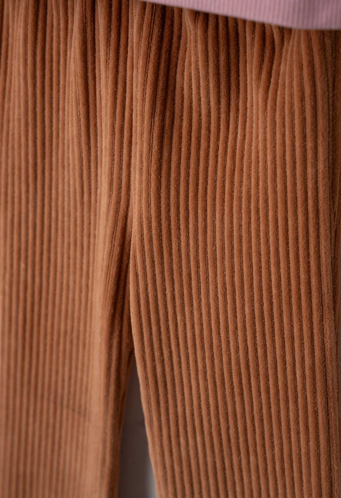 Jumper and trousers with handbag